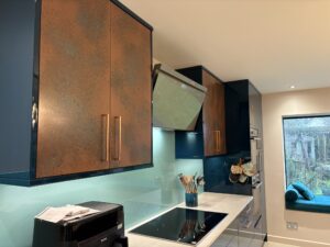 Sienna Orange, Majestic Teal & Oxidised Copper | Panelven Kitchens | Hampshire 