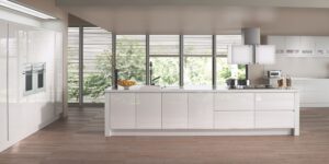 White Gloss - J pull Slab Kitchen | Panelven Kitchens | Hampshire